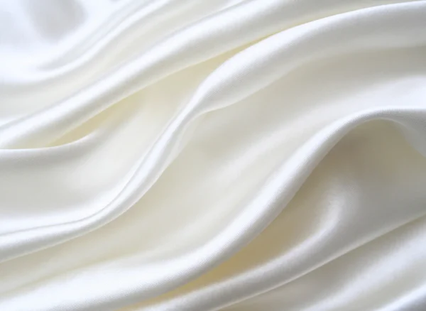 Gładkie elegancki biały jedwab jako tło — Zdjęcie stockowe