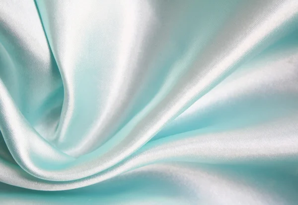 Glatte elegante blaue Seide als Hintergrund — Stockfoto