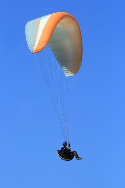 Paraglider flying clipart