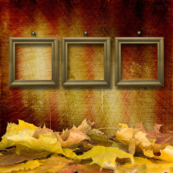 The fallen leaves on the background wall with vintage wallpaper