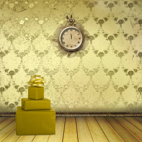 Antique clock and boxes of gifts in the old room with the remain — Stock Photo, Image
