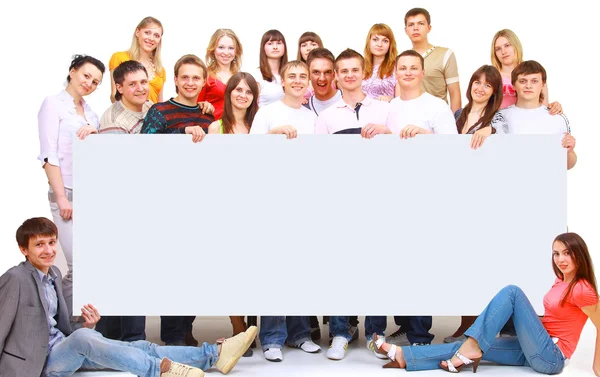 Group of cheerful holding a banne — Stock Photo, Image
