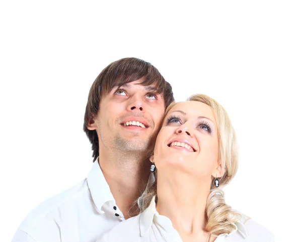 Couple having embraced look afar on a white background — Stock Photo, Image