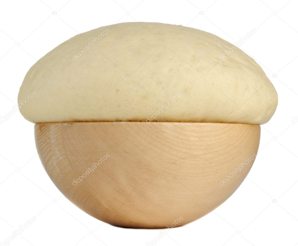 Yeast Dough in Wooden Bowl