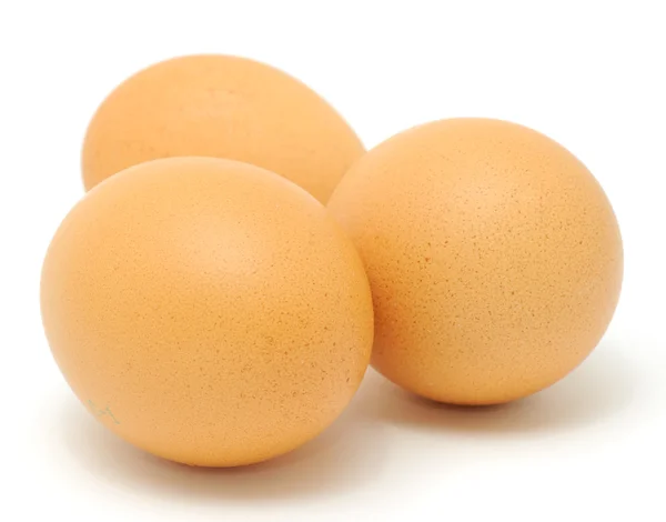 Trei ouă de pui brune — Fotografie, imagine de stoc
