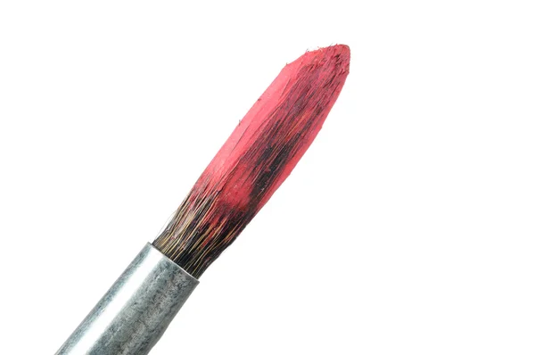 Pincel con pintura roja seca — Foto de Stock