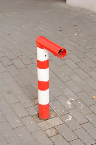 Parking Barrier on Paved Sidewalk (Pavement) — Stock Photo, Image