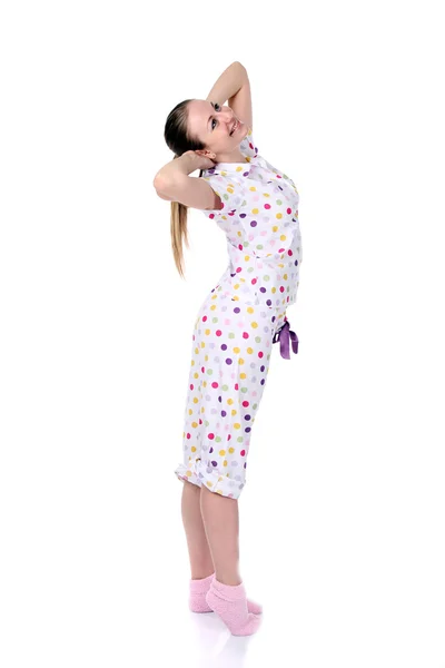 Jonge vrouw in pyjama 's — Stockfoto