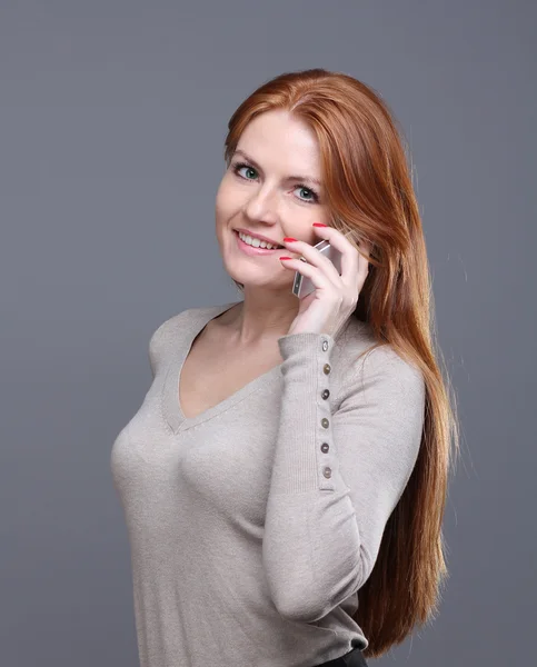Happy woman calling by phone — Stock Photo, Image