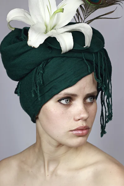 Girl in a green head scarf — Stock Photo, Image