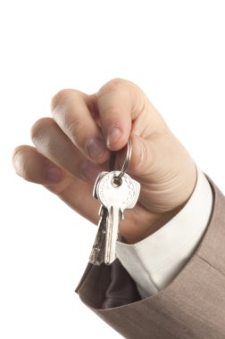 Key in businessman's hands clipart