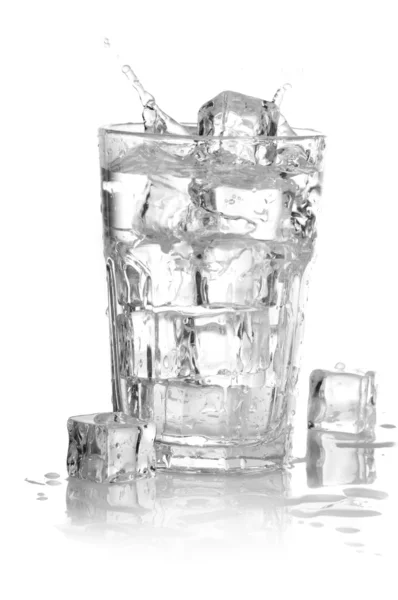 Splashing water in glass ower white background — Stock Photo, Image