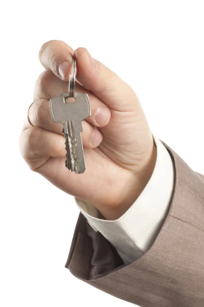 Key in businessman's hands — Stock Photo, Image