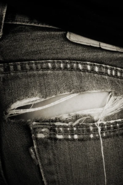 Порванные джинсы — стоковое фото