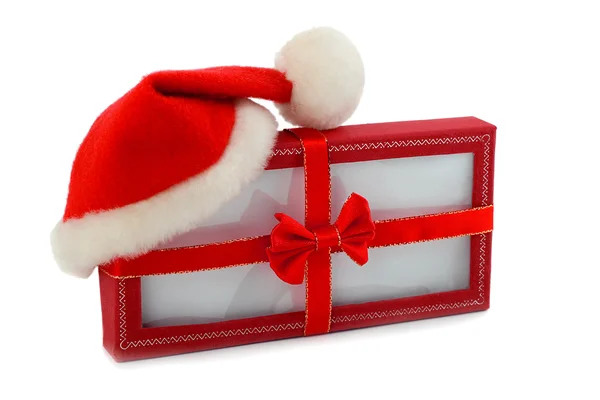 In santa hat Christmas gift — Stock Photo, Image