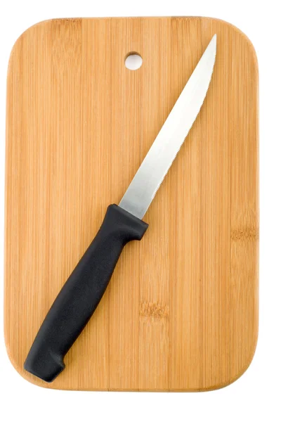 Couteau de cuisine sur la planche à découper — Photo