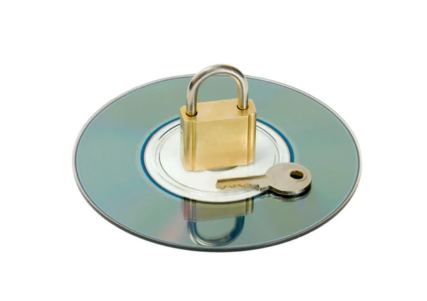 Padlock key in CD disc — Stock Photo, Image
