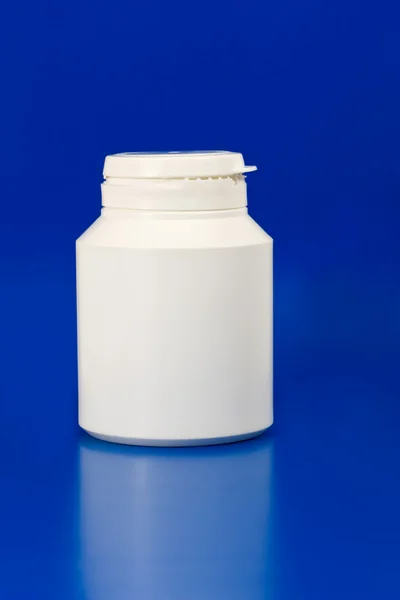 Білий пластиковий контейнер для медицини — стокове фото