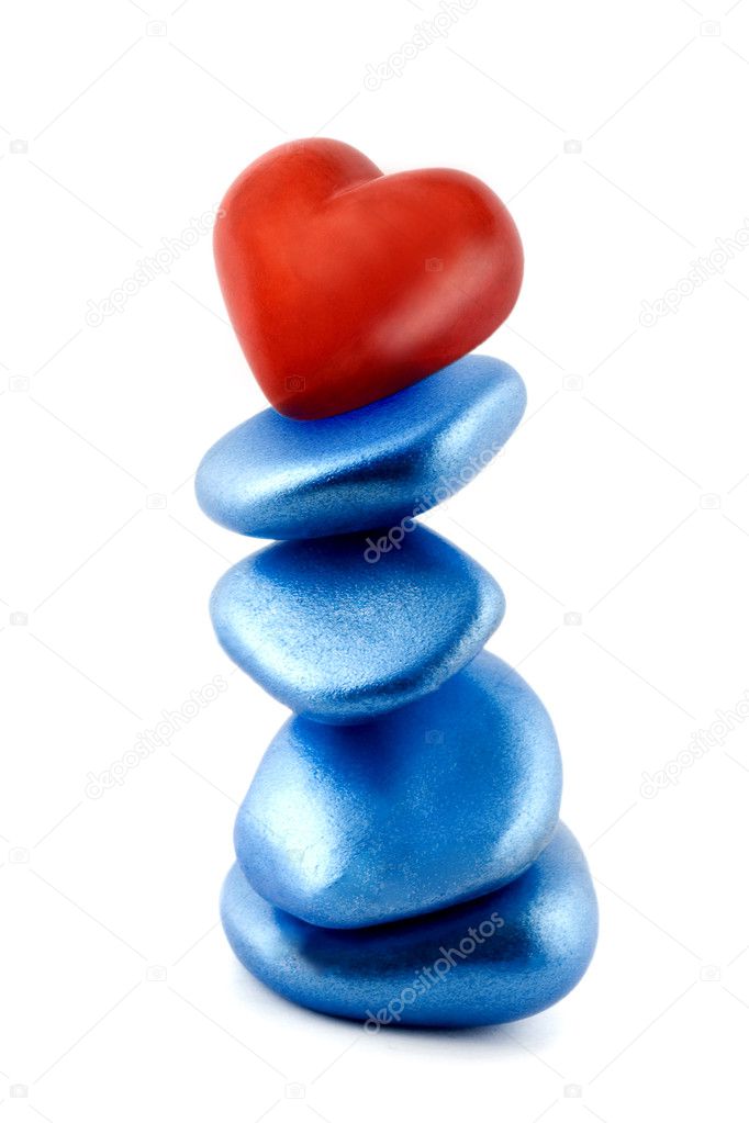 Balance red heart in stone