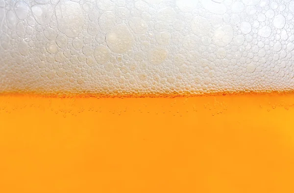 Espuma de cerveja textura de fundo — Fotografia de Stock