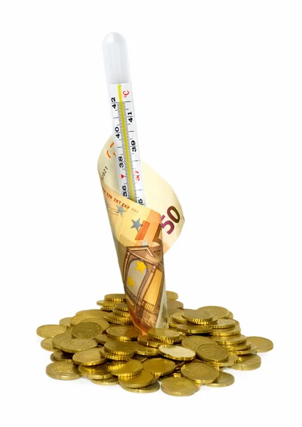Coins and thermometer — Stock Photo, Image