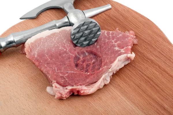 Cutelo de carne em costeletas de porco frescas — Fotografia de Stock