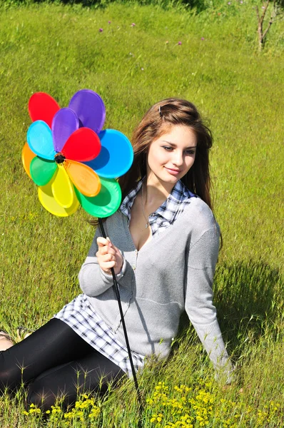 Girl with windmill — Stock Photo, Image