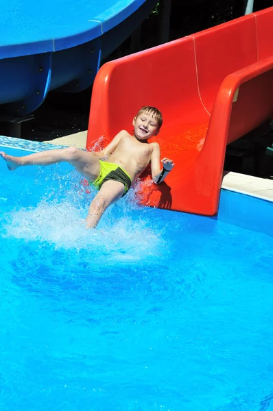 From slide to water — Stock Photo, Image