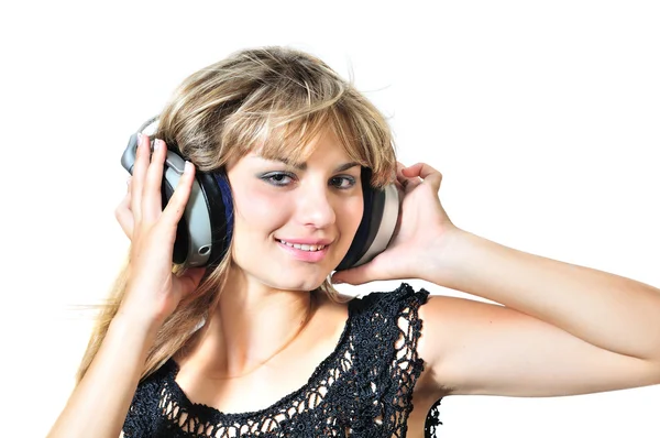 Boldog tini lány fülhallgatóval — Stock Fotó