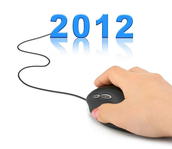 Рука з комп'ютерною мишкою і 2012 — стокове фото