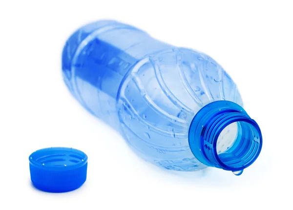 Пляшка і крапля води — стокове фото