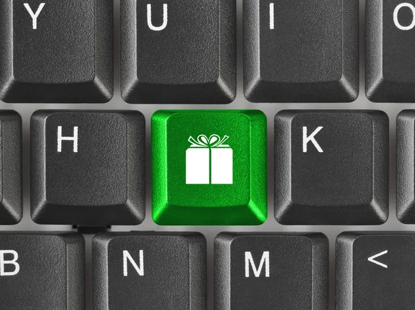 ギフトのキーを持つコンピューターのキーボード — ストック写真