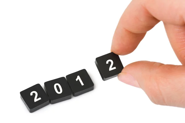 Numbers 2012 and hand — Stock Photo, Image