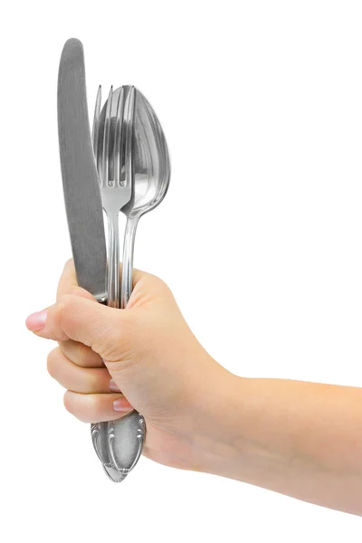 Fork and spoon in hand — Stock Photo, Image