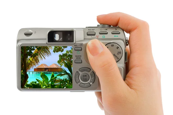Hand with camera and landscape (my photo) — Stock Photo, Image