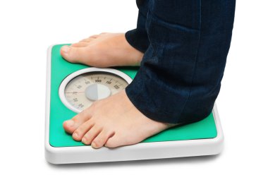 Woman feet and weight scale clipart