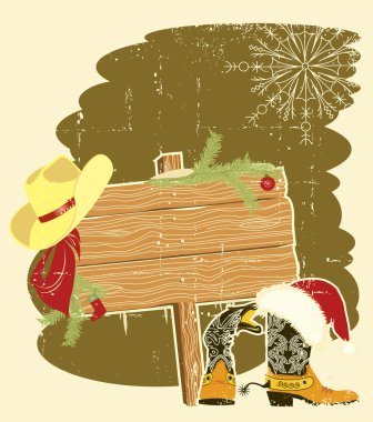 Billboard frame with cowboy boots and Santa's red hat on wood wa clipart