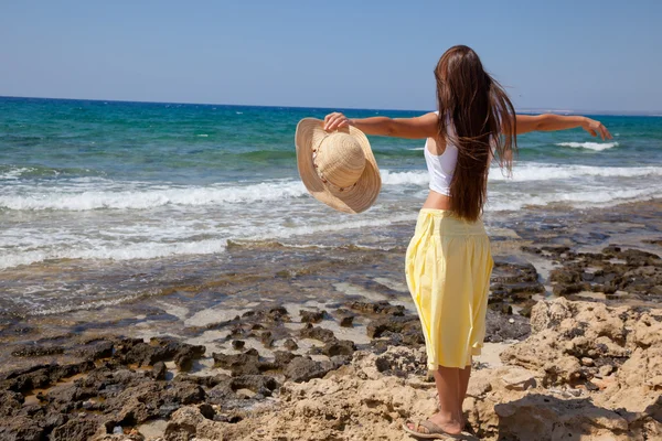 Woman is looking at the sea — Zdjęcie stockowe