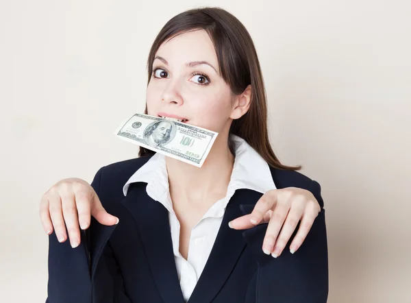 Young woman with 100 dollars in her mouth — Stock Photo, Image