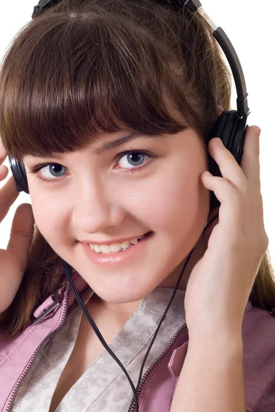 Attraktiva flicka med hörlurar — Stockfoto