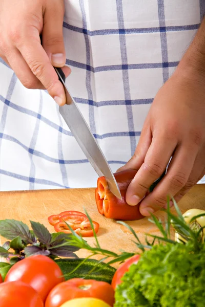 Man cutting vegetables — Stock Photo, Image