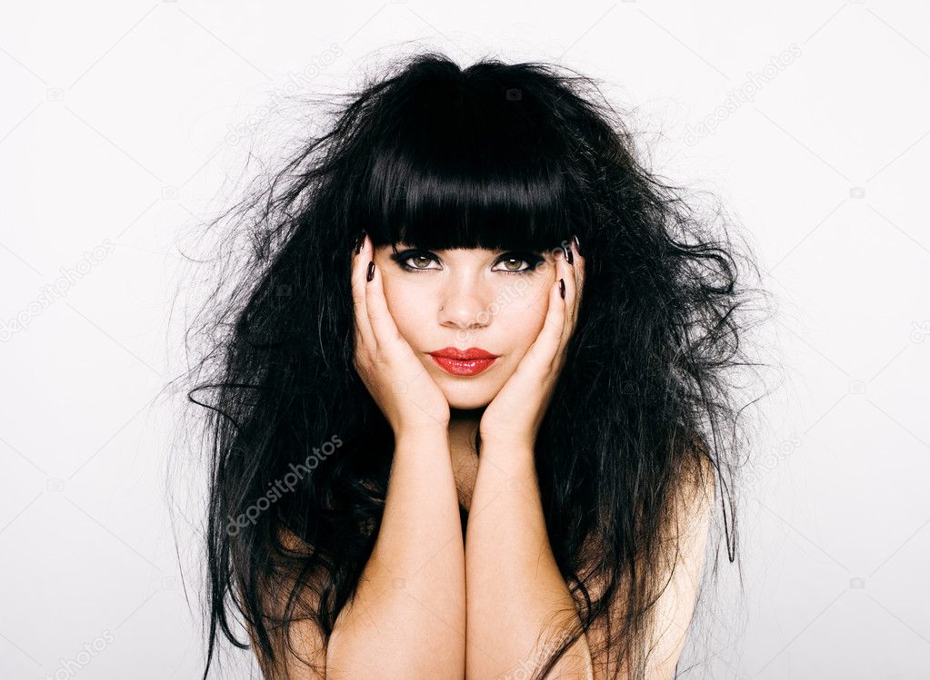 Portrait of sensual woman with magnificent bushy hair
