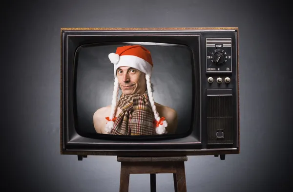 Lustige Weihnachtsmann-Wünsche im Retro-TV. — Stockfoto