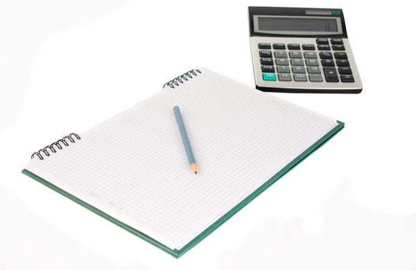 Livro de escritório com um lápis e uma calculadora — Fotografia de Stock