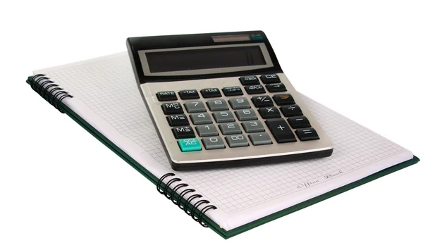 Livro de escritório com uma calculadora — Fotografia de Stock