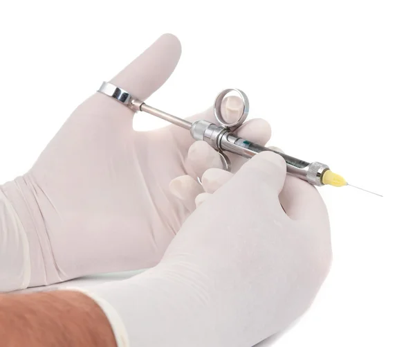 Syringe in the hands of the dentist — Stock Photo, Image