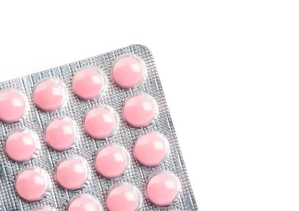 Förpackning med rosa tabletter — Stockfoto