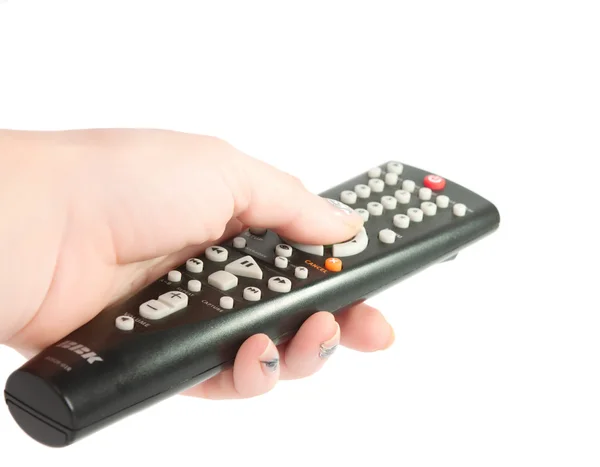 Control remoto de TV negro en la mano — Foto de Stock