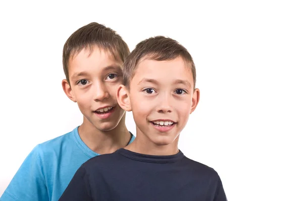 Smiling twins isolated — Stock Photo, Image