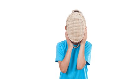 Boy playing with a basket